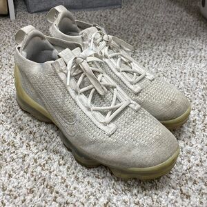 white nike athletic sneakers